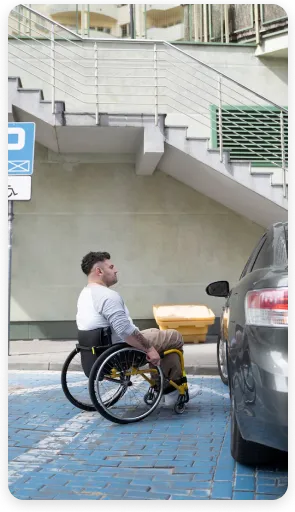 Wheelchair next to car